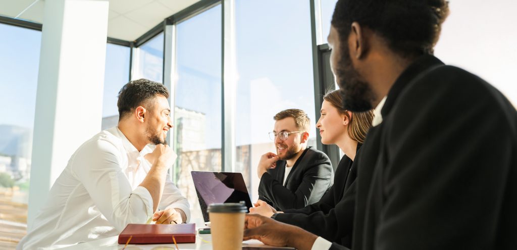 Group of office workers holding a meeting